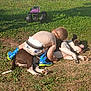 toddler, dog, grass, outdoor, child, bareback, boots, toy, playground, sunlight, pet, animal, summer, nature, relaxation, playtime, backyard, childhood, fun, casual