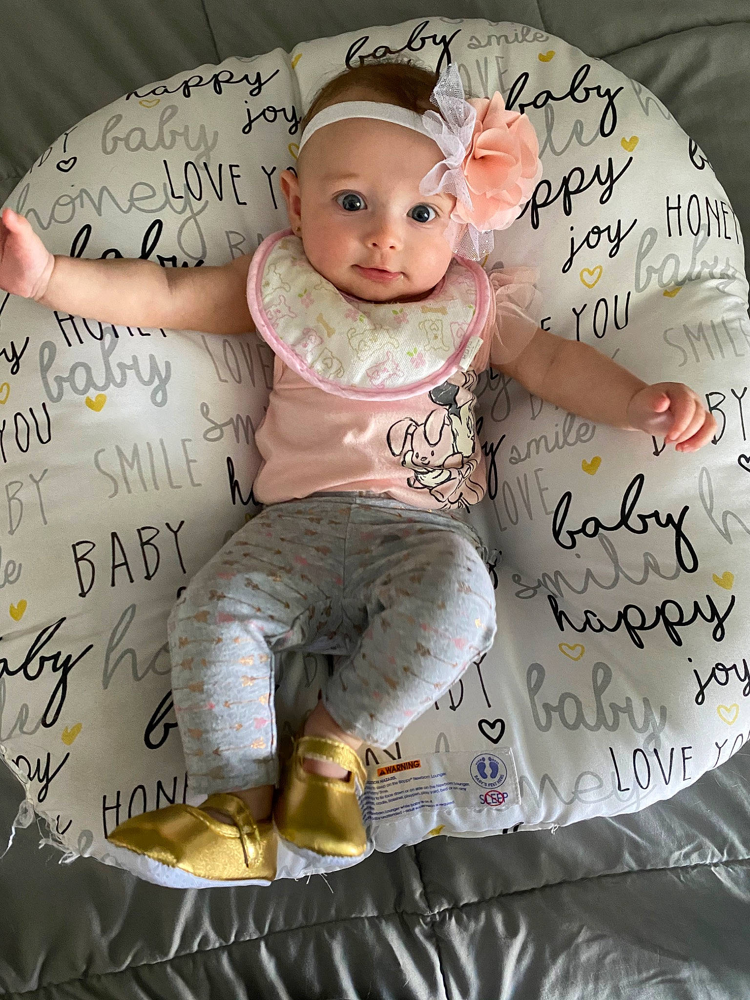 Addalynn is registered to the contest to win money with this photo: baby, baby_products, baby_toddler_clothing, child, hair_accessory, headwear, pattern, person, photo_caption, product, toddler