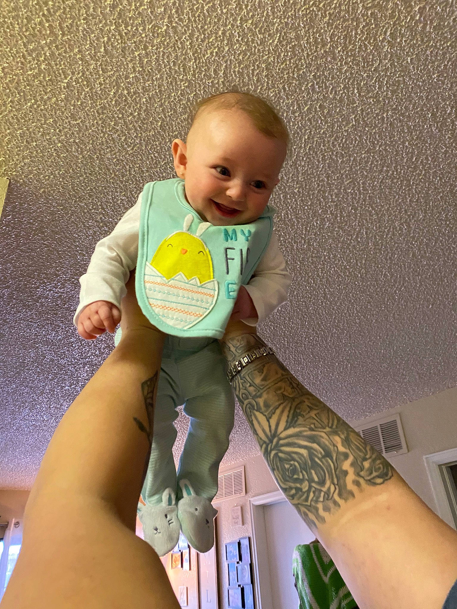 Addalynn is registered to the contest to win money with this photo: arm, baby, child, elbow, finger, hand, human_leg, joint, joy, knee, leg, person, skin, sleeve, tattoo, thigh, toddler
