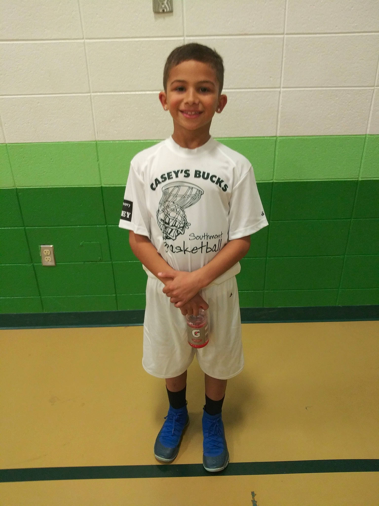 Jace is registered to the contest to win money with this photo: child, competition_event, joy, person, room, sportswear, t_shirt