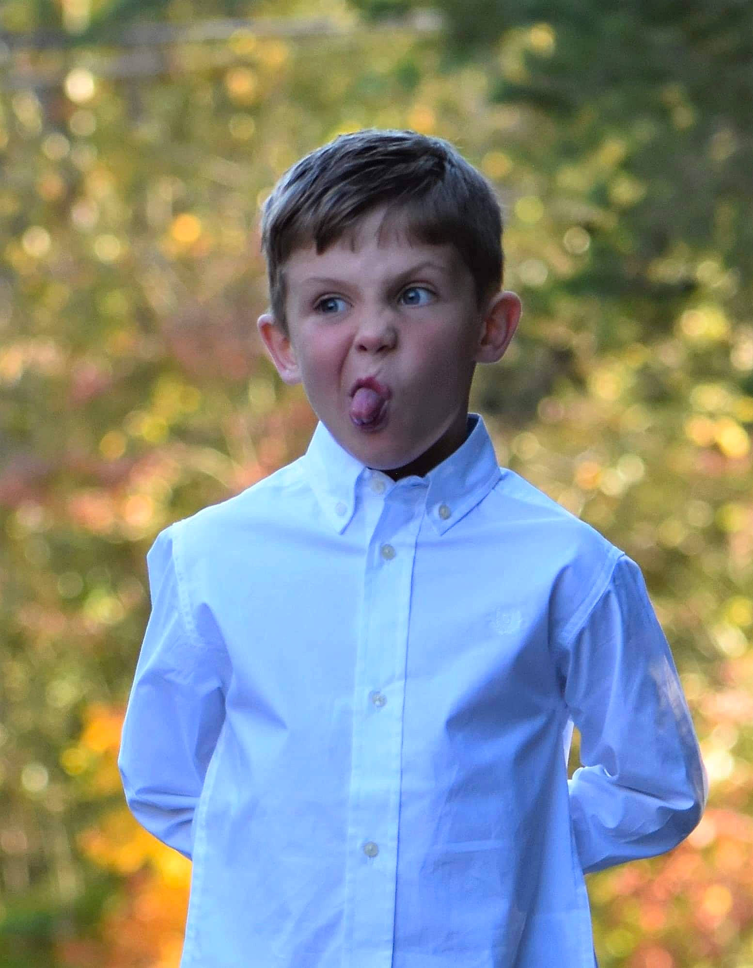 Noah joined the competition — help win amazing prizes! anger, bow_tie, child, dress_shirt, formal_wear, person, shirt, sleeve, smile, uniform