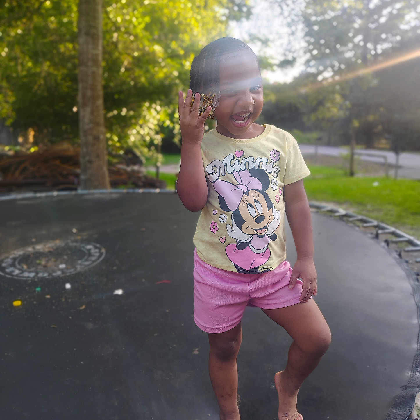 Ma'Kiya joined the competition — help win amazing prizes! barefoot, child, daylight, fun, grass, happy, minnie_mouse, nature, outdoor, person, playful, portrait, shorts, smiling, summer, sunlight, trampoline, trees, tshirt, young