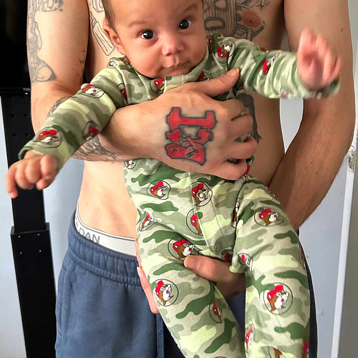Trevir joined the competition — help win amazing prizes! arm, baby, bodypart, clothing, face, finger, hand, happy, head, jeans, military, newborn, pajamas, pants, person, photography, portrait, skin, sleeve, tattoo