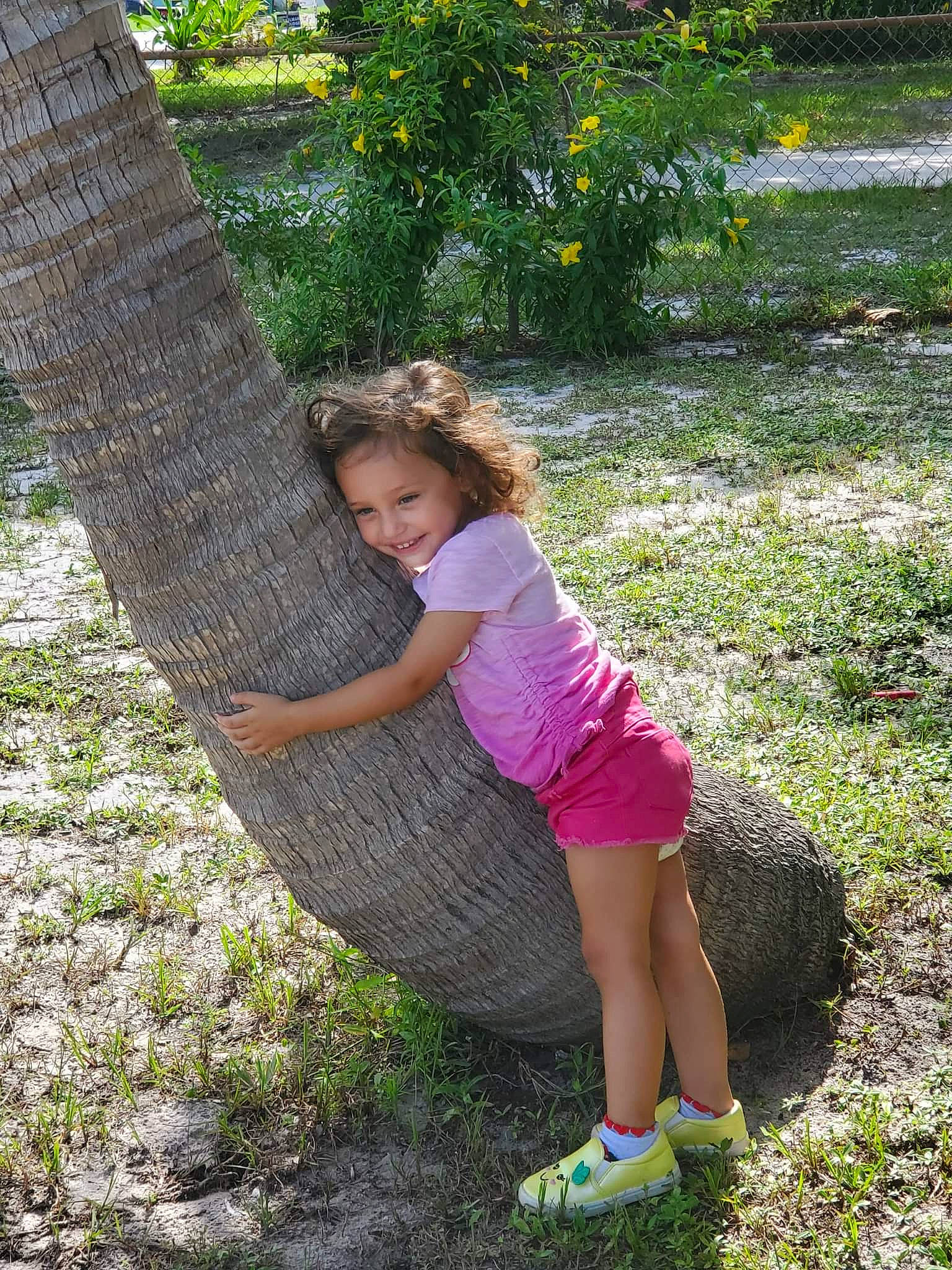 Rosalie joined the competition — help win amazing prizes! forest, grass, groundcover, hair, happy, joy, leisure, people_in_nature, person, plant, recreation, sandal, shoe, shrub, sneakers, summer, terrestrial_plant, tree, trunk, wood