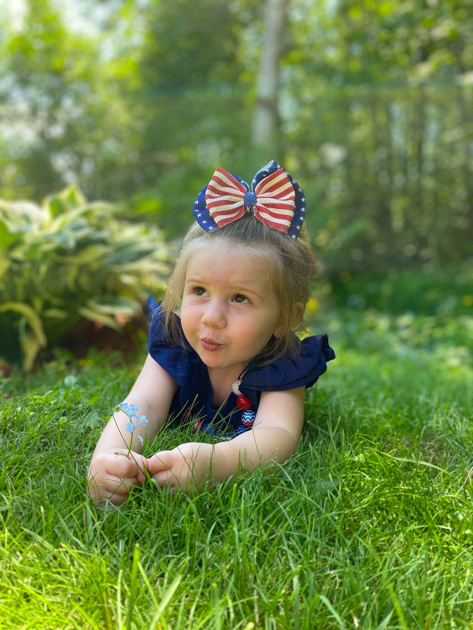 Kenzleigh is registered to the contest to win money with this photo: child, child_model, fun, grass, grass_family, green, hair_accessory, happy, headpiece, lawn, meadow, people_in_nature, person, photography, plant, portrait_photography, smile, summer, toddler, tree