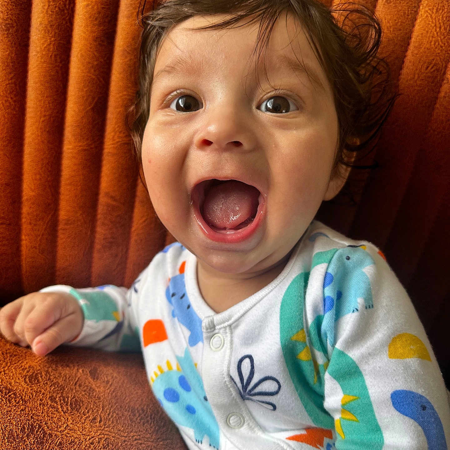 Kaya Ediz is registered to the contest to win money with this photo: baby, babylaughing, bodypart, chair, clothing, couch, face, finger, furniture, hand, happy, head, knitwear, laughing, mouth, person, photography, portrait, sweater, tongue