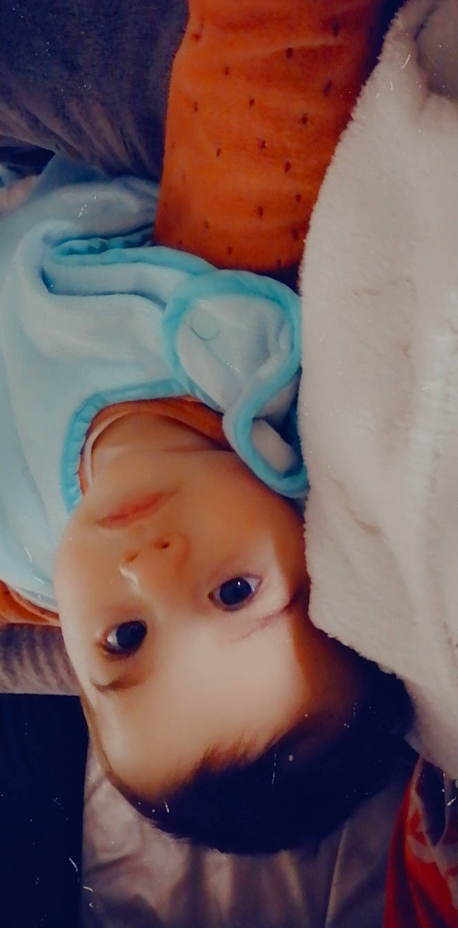 Santiago a rejoint le concours — aidez-le/la à gagner de superbes lots ! baby, baby_sleeping, cap, cheek, child, doll, electric_blue, eye, eyelash, fashion_accessory, headgear, iris, knit_cap, linens, mouth, nose, person, portrait_photography, skin, toddler