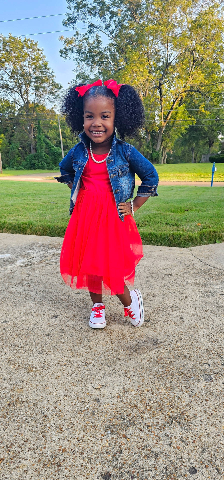 Marlei House is registered to the contest to win money with this photo: child, clothing, coat, face, female, footwear, girl, grass, head, jacket, nature, outdoors, pants, park, person, photography, plant, portrait, shoe, tree