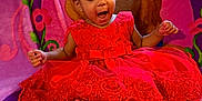 Esteisy joined the competition — help win amazing prizes! toddler, child, red_dress, bow, sitting, blanket, princess_theme, happy, indoors, curtains, window, smiling, feet, face, young_child, portrait, colorful, fabric, home, excited
