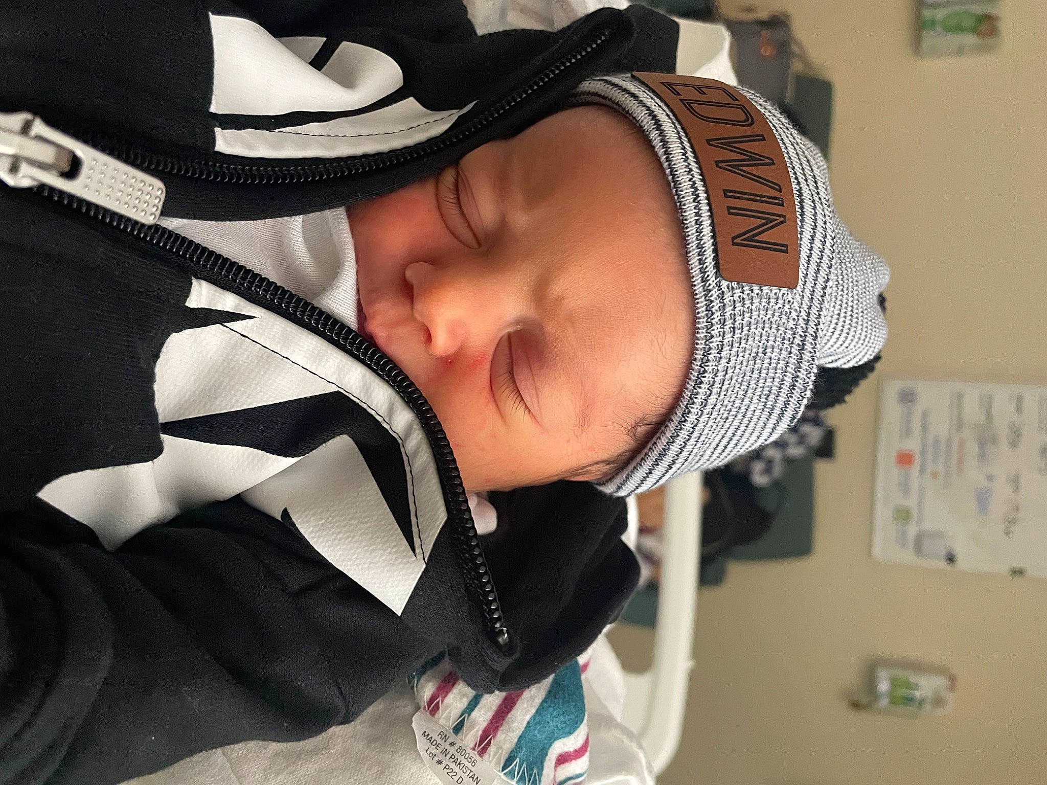 Edwin is registered to the contest to win money with this photo: audio_equipment, baby, baby_carriage, baby_products, cap, carmine, child, comfort, eyelash, eyewear, fashion_accessory, fun, happy, hat, headwear, person, personal_protective_equipment, sun_hat, toddler, tree