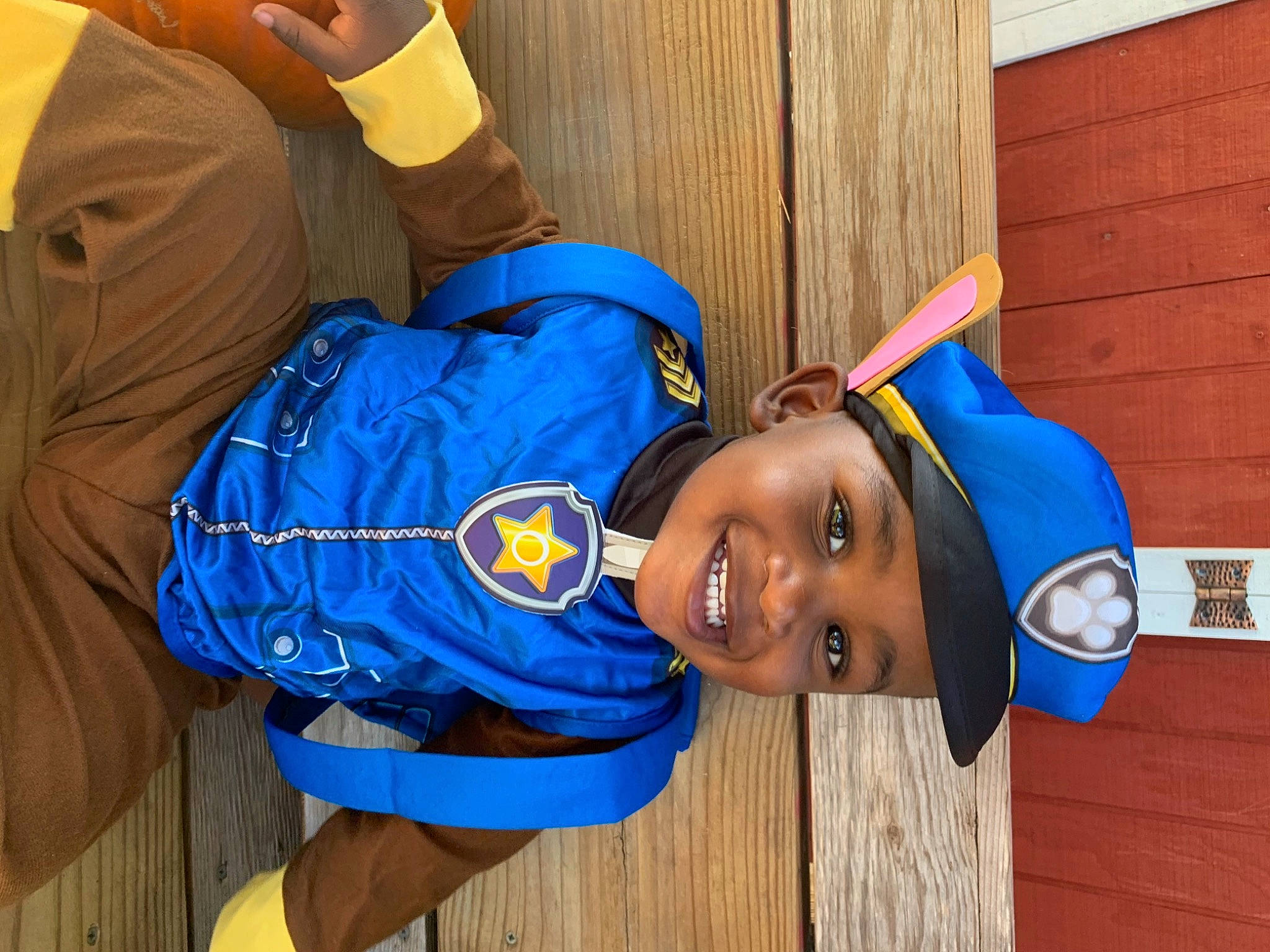 Kasyn is registered to the contest to win money with this photo: baby_toddler_clothing, backpack, bag, cobalt_blue, electric_blue, headwear, joy, person, sports_jersey, tooth