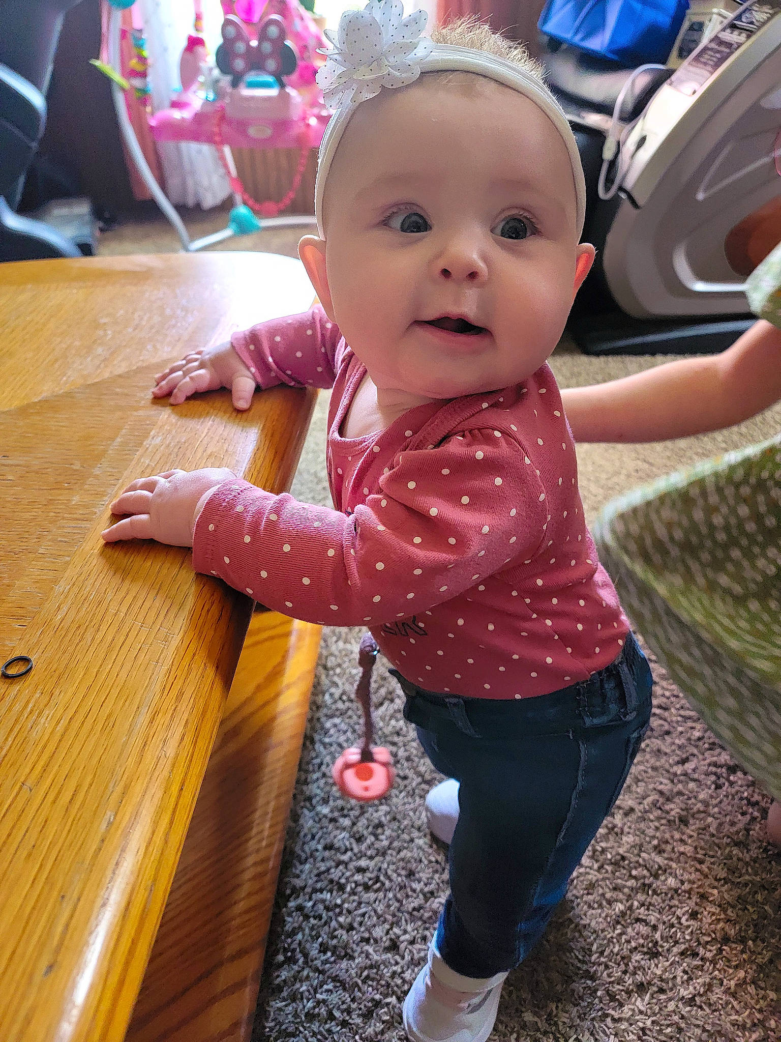 Barbara June joined the competition — help win amazing prizes! baby, baby_toddler_clothing, cheek, child, flooring, fun, happy, hardwood, magenta, pattern, person, pink, purple, skin, sleeve, smile, standing, table, toddler, wood