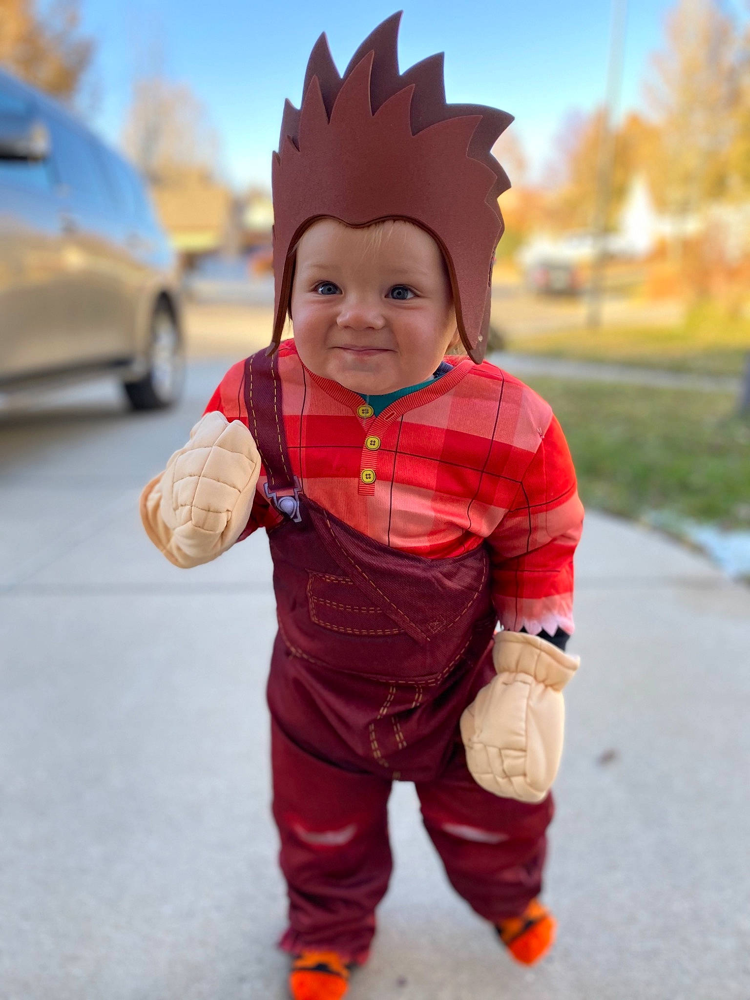 Decker is registered to the contest to win money with this photo: car, child, costume, joy, outerwear, person, photography, toddler, vehicle