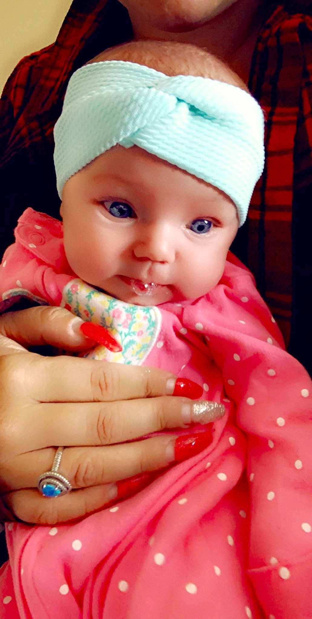 Everleigh is registered to the contest to win money with this photo: baby, bonnet, cheek, child, head, headgear, headwear, lip, mouth, person, pink, skin, smile, toddler
