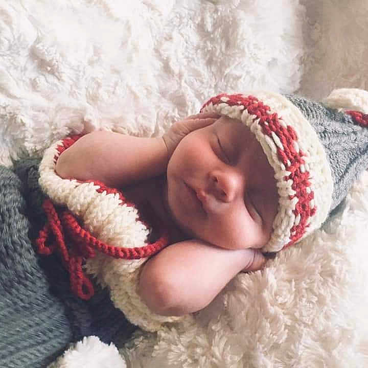 Zackary is registered to the contest to win money with this photo: baby, baby_sleeping, beanie, bonnet, cap, child, crochet, ear, fun, fur, headgear, knit_cap, knitting, nap, photography, skin, sleep, smile, toddler, wool