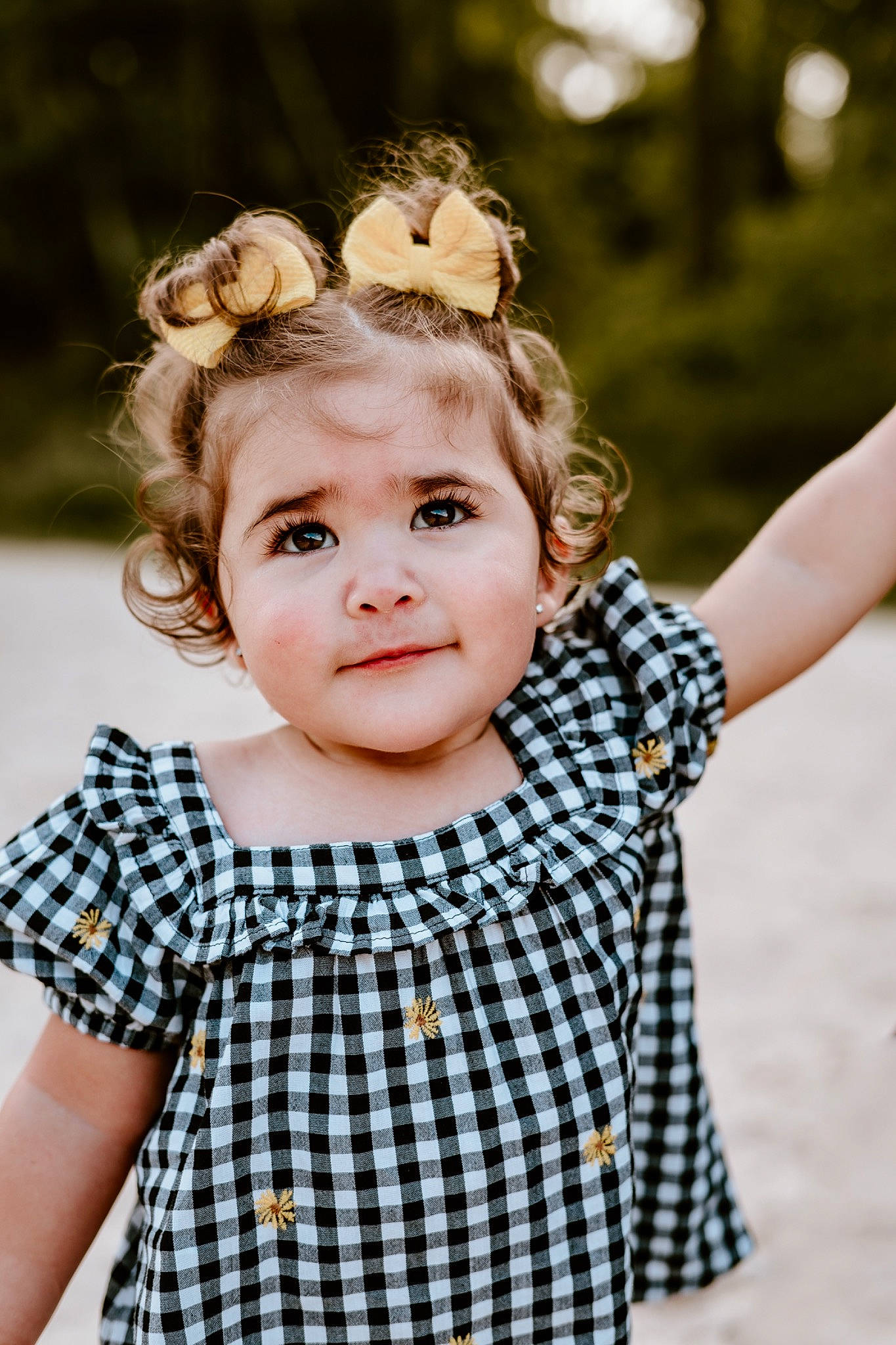 Kaci is registered to the contest to win money with this photo: baby_toddler_clothing, blond, child, day_dress, eye, face, flash_photography, gesture, grass, happy, head, headpiece, pattern, people_in_nature, person, plaid, shoulder, sleeve, standing, toddler
