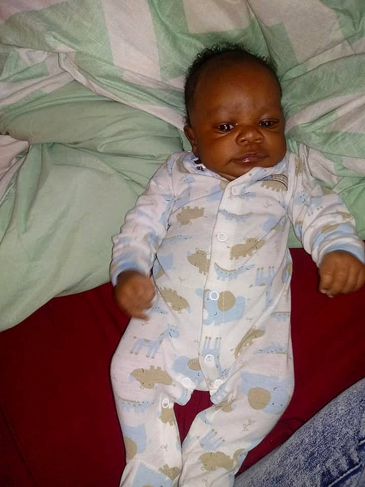 Tyshawn is registered to the contest to win money with this photo: baby, baby_toddler_clothing, cheek, child, person, skin, sleep, smile, toddler