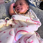 Kaliyah is registered to the contest to win money with this photo: baby, newborn, blanket, pacifier, sleeping, smile, infant, soft, cute, cozy, bed, fabric, comfort, rest, child, portrait, wrapped, peaceful, indoors, relaxation