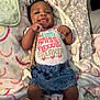 baby, infant, smiling, onesie, pacifier, blanket, lying_down, cute, child, clothing, happy, indoors, patterned, soft, person, toddler, skin, head, hands, feet