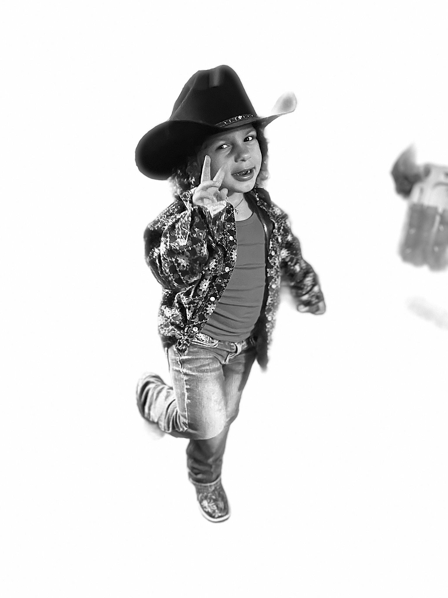 Paislee joined the competition — help win amazing prizes! arm, costume_hat, cowboy_hat, fashion_accessory, fashion_design, fur, gesture, happy, hat, headwear, human_body, illustration, monochrome, monochrome_photography, pattern, people_in_nature, person, sleeve, style, sun_hat