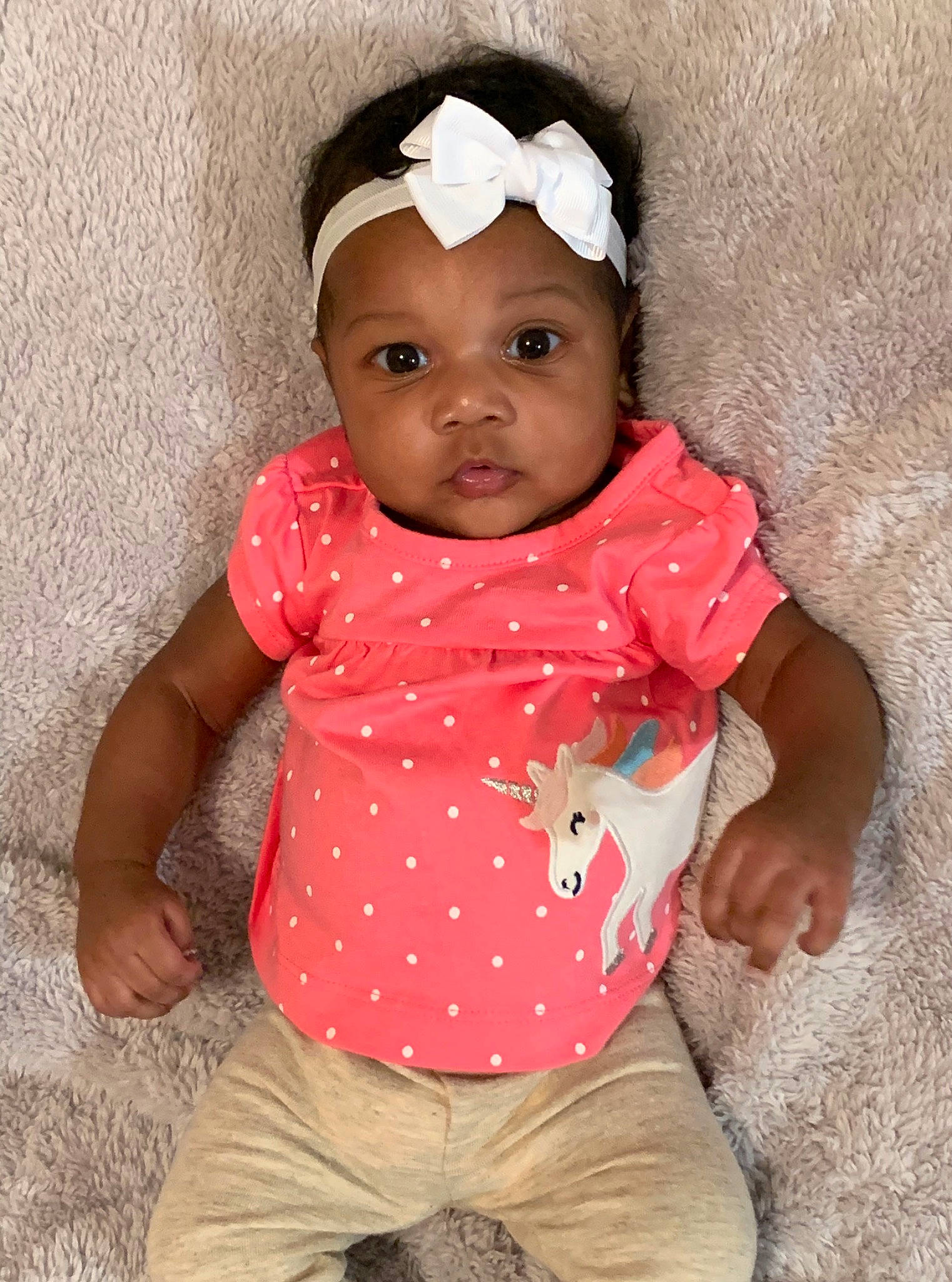 Casey joined the competition — help win amazing prizes! baby, baby_products, baby_toddler_clothing, cheek, child, design, hair_accessory, head, headgear, headwear, lip, pattern, person, pink, polka_dot, product, skin, smile, toddler