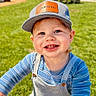 Cameron joined the competition — help win amazing prizes! toddler, child, smiling, blue_eyes, cap, hat, overalls, striped_shirt, outdoor, grass, sunny, happy, cute, young_child, portrait, baby, person, daylight, nature, clothing