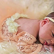 Sophia May Leno is registered to the contest to win money with this photo: newborn, baby, infant, headband, flower, lace, peach, soft, sleeping, portrait, cute, skin, resting, toddler, child, fluffy, blanket, closeup, peaceful, adorable