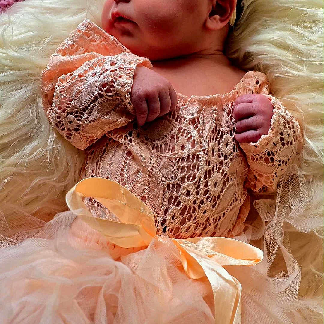 Sophia May Leno joined the competition — help win amazing prizes! baby, blanket, cozy, cream, cute, face, flower, hands, headband, infant, lace, newborn, pastel, peach, pink, portrait, ribbon, sleepy, soft, tulle
