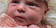Sophia May Leno is registered to the contest to win money with this photo: baby, newborn, infant, face, headband, flower, peach, lace, clothing, hand, skin, portrait, closeup, cute, sleepy, soft, texture, fluffy, resting, child