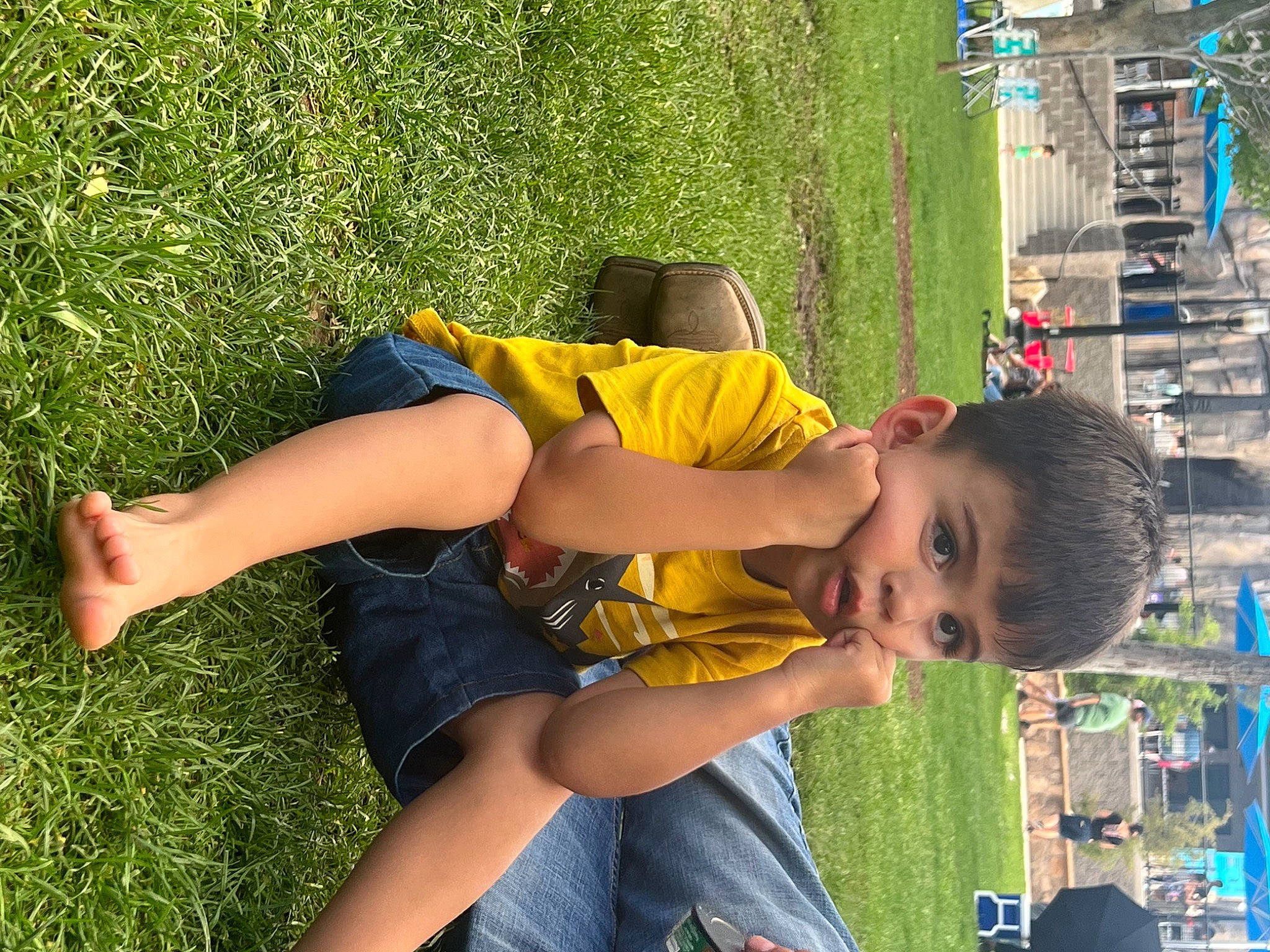 Noah is registered to the contest to win money with this photo: blue, fun, grass, green, happy, human_leg, joint, knee, leisure, people_in_nature, person, plant, recreation, shorts, smile, summer, t_shirt, thigh, toddler, tree