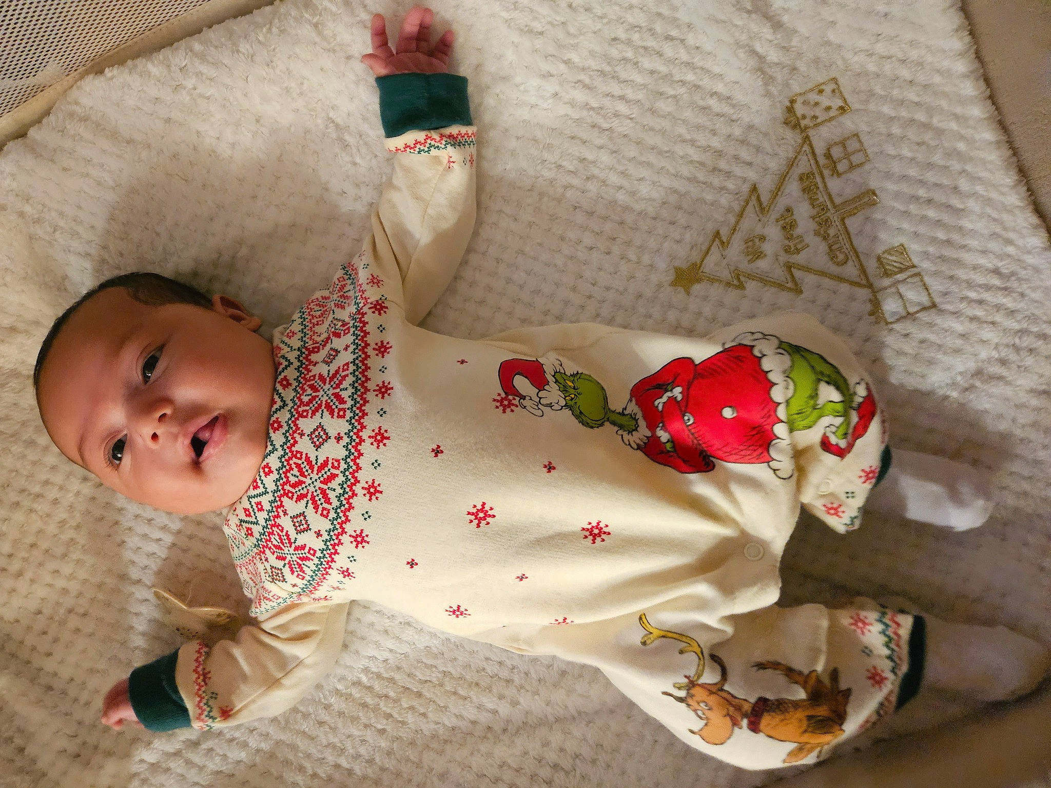 Azriel is registered to the contest to win money with this photo: baby, baby_products, baby_safety, baby_sleeping, baby_toddler_clothing, carmine, child, comfort, doll, dress, fashion_accessory, human_body, linens, pattern, person, room, sleeve, textile, toddler, wool