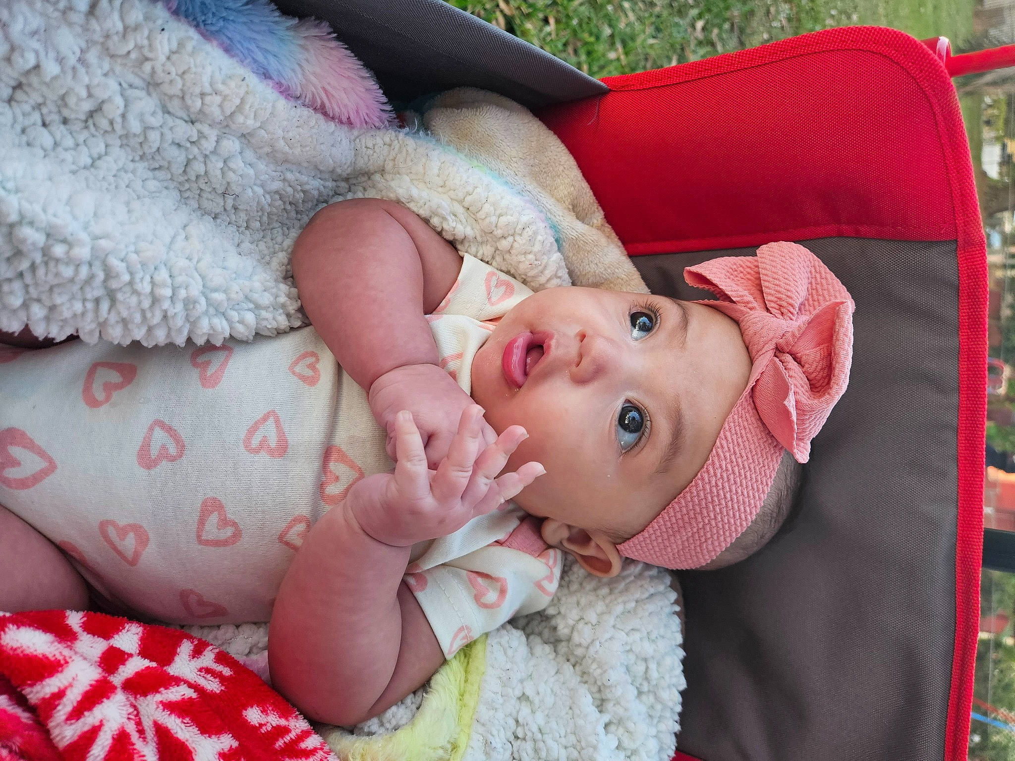 Azriel joined the competition — help win amazing prizes! baby, baby_products, baby_toddler_clothing, cheek, child, comfort, eye, eyelash, grass, happy, head, headwear, lip, nose, organ, pattern, person, pink, product, skin