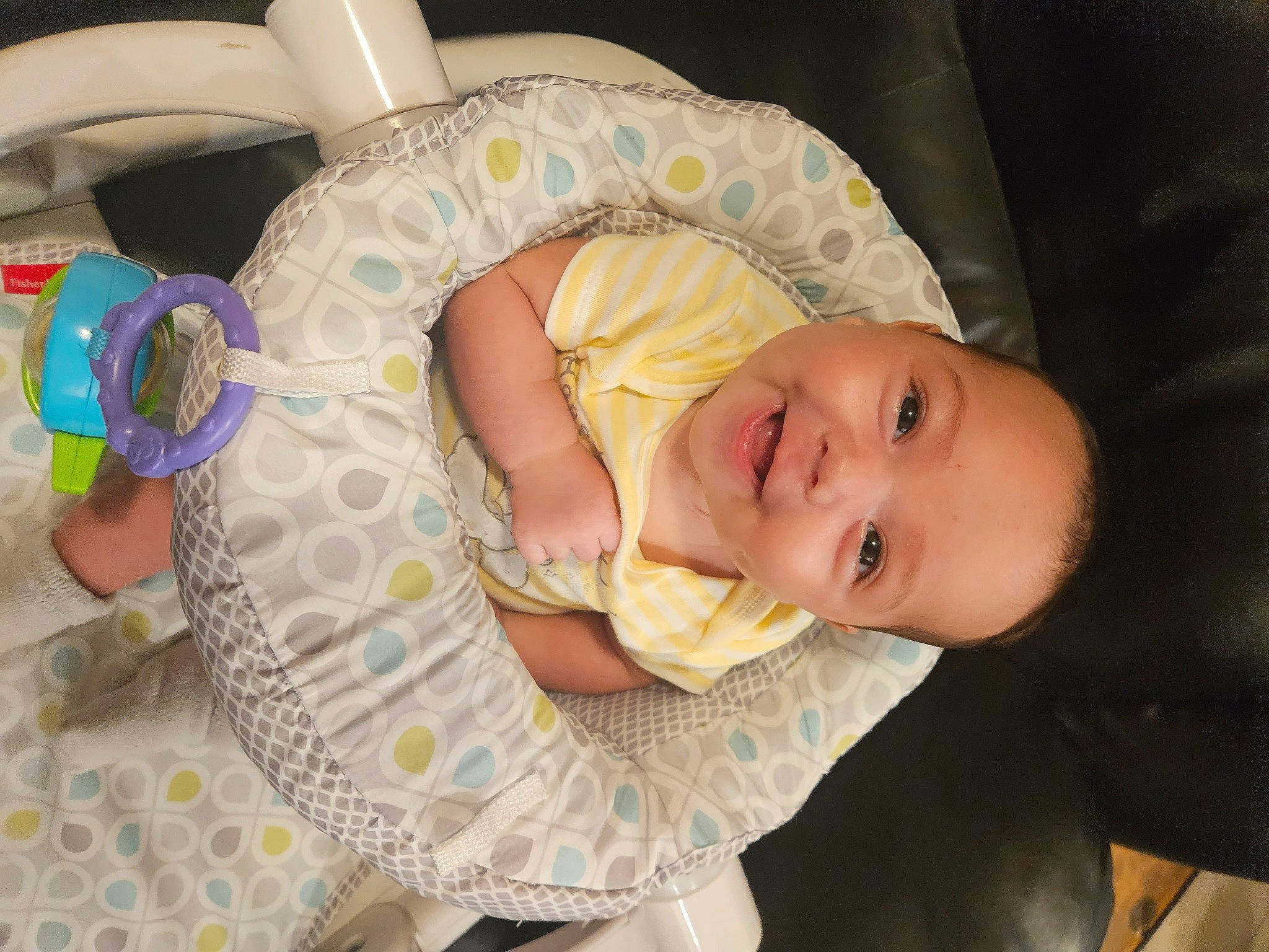 Azriel is registered to the contest to win money with this photo: baby, baby_products, baby_toddler_clothing, cheek, child, comfort, finger, happy, hat, headgear, iris, joy, linens, person, room, sitting, skin, smile, textile, toddler