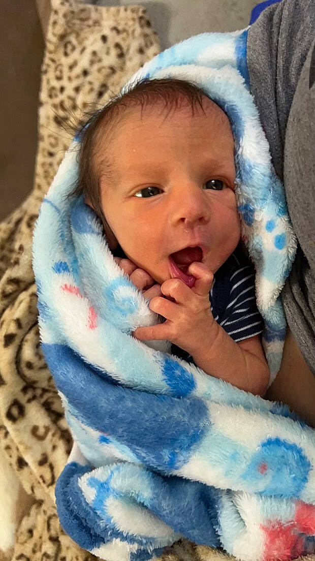 Brody joined the competition — help win amazing prizes! azure, baby, baby_toddler_clothing, blue, cheek, comfort, eye, eyelash, finger, gesture, hand, happy, iris, lip, mouth, nose, person, skin, textile, thumb