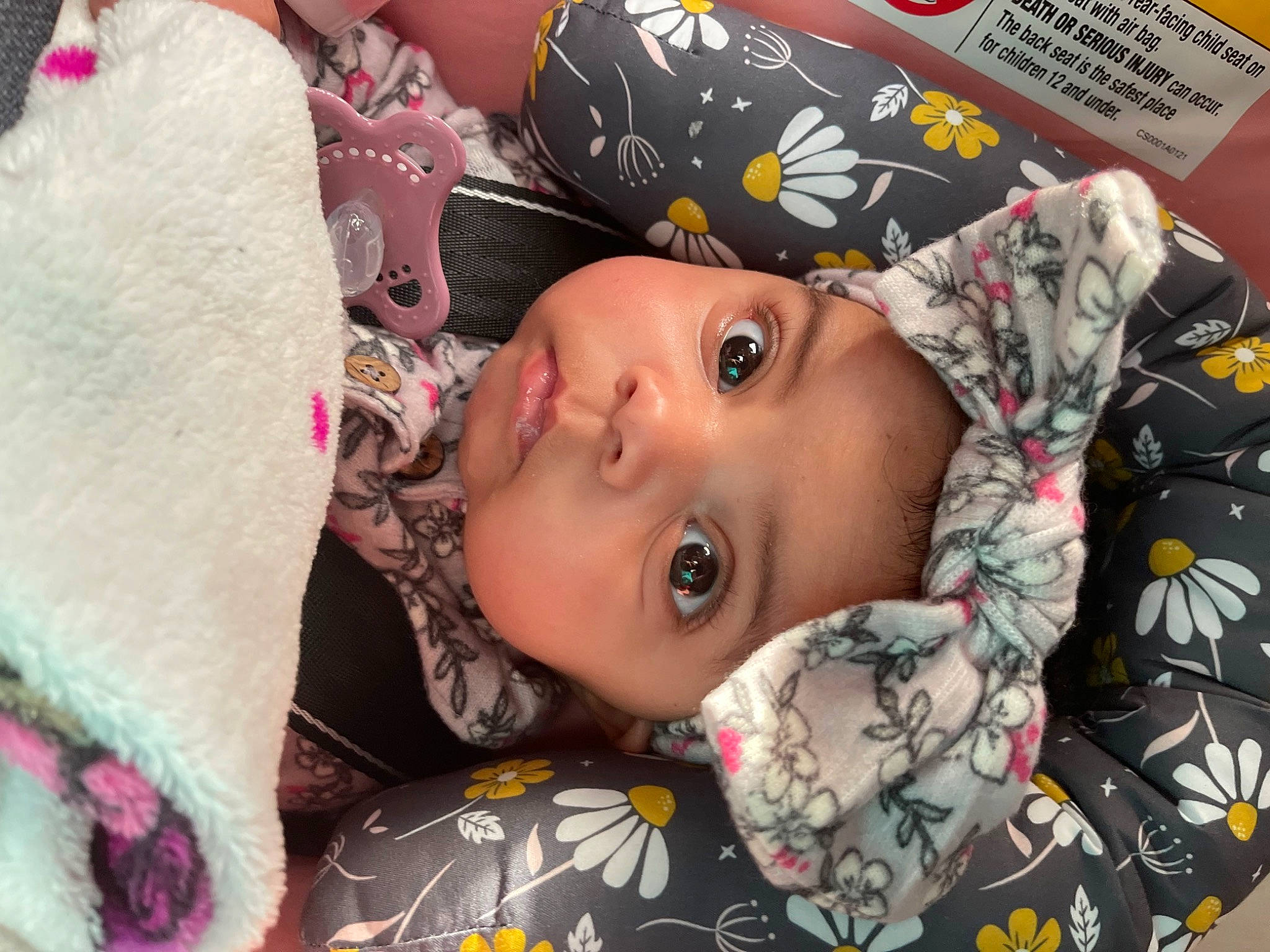 Zylah is registered to the contest to win money with this photo: baby, baby_toddler_clothing, cheek, child, comfort, eyelash, fun, happy, head, headwear, human, iris, linens, lip, nose, pattern, person, portrait_photography, skin, sleeve