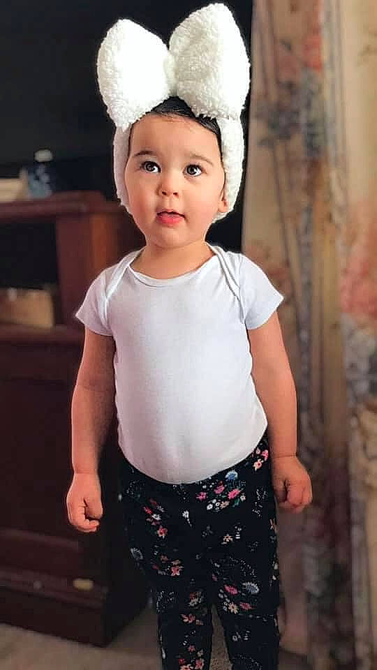 Emberlynn is registered to the contest to win money with this photo: baby_toddler_clothing, cap, cool, costume_hat, eye, face, flash_photography, hairstyle, happy, head, headband, iris, lip, neck, outerwear, person, pink, sleeve, smile, surprise