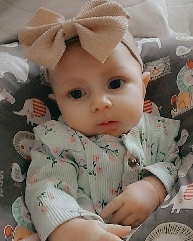Tinsley joined the competition — help win amazing prizes! baby, baby_toddler_clothing, cheek, child, chin, doll, eye, eyelash, facial_expression, hairstyle, head, headwear, iris, lip, pattern, person, pink, skin, sleeve, textile