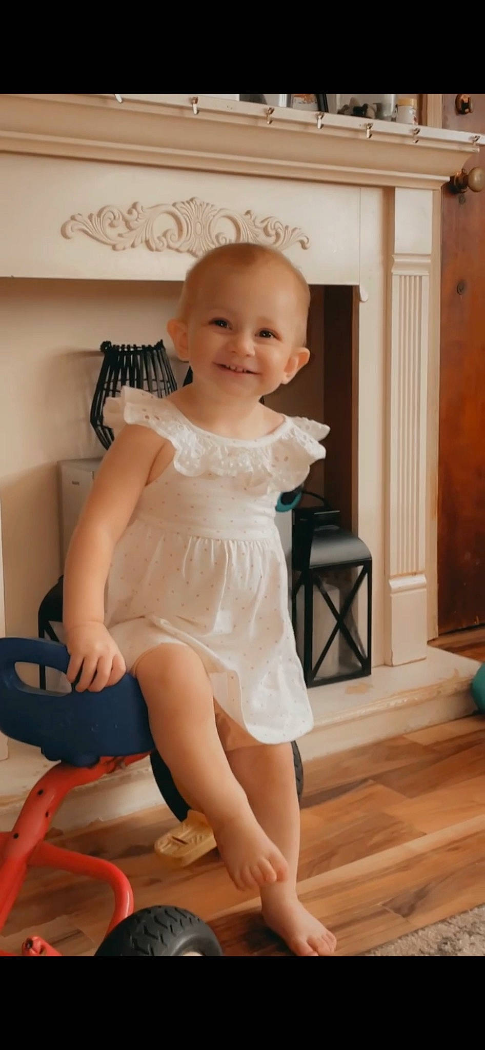 Tinsley joined the competition — help win amazing prizes! arm, baby_toddler_clothing, child, door, dress, flooring, foot, happy, human_leg, joy, knee, leg, person, shoulder, skin, sleeve, smile, thigh, toddler, trunk