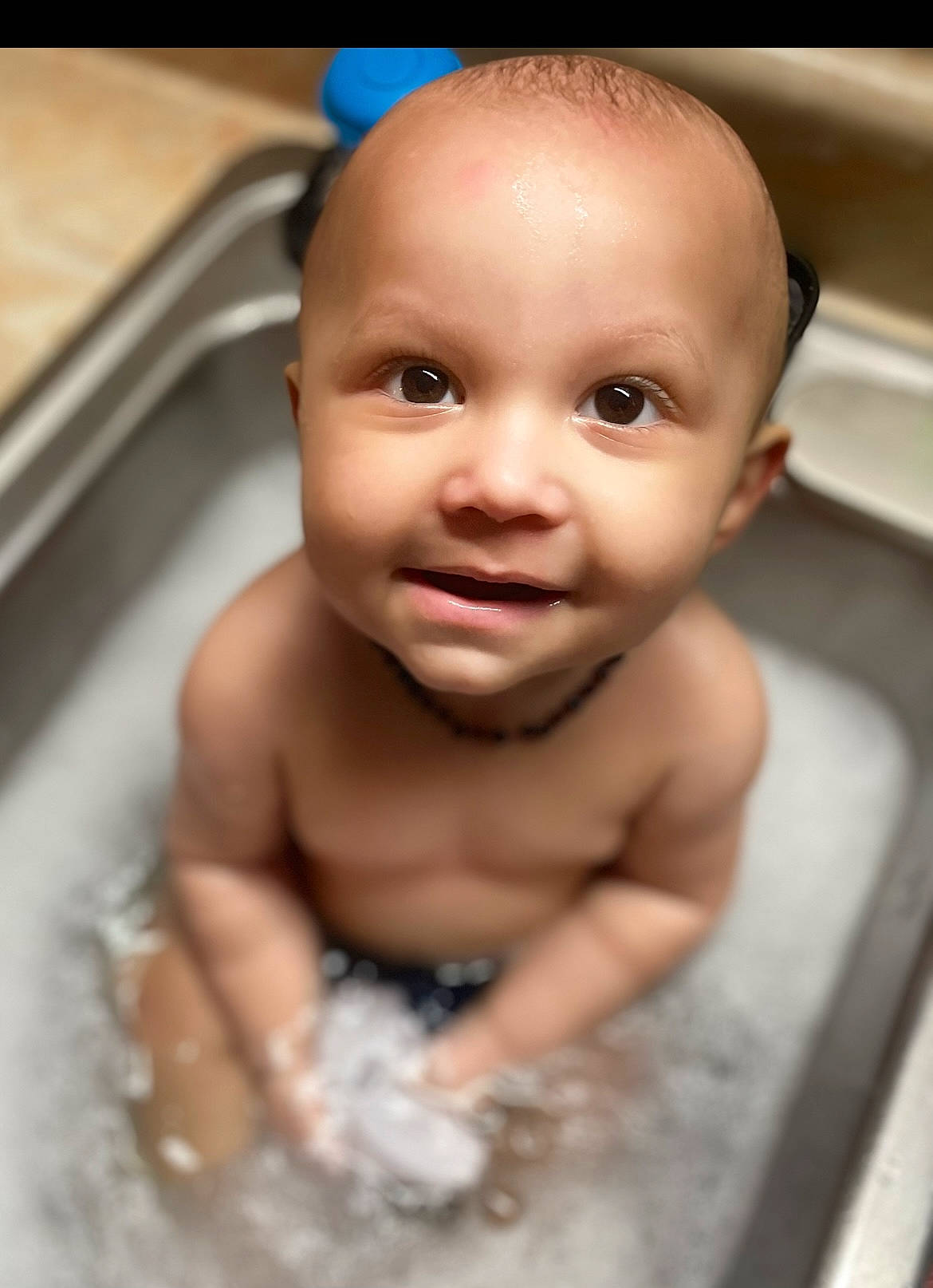 Lux is registered to the contest to win money with this photo: baby, baby_bathing, bathing, bathroom, cheek, chest, eye, eyelash, fluid, iris, jaw, lip, liquid, mouth, neck, nose, person, plumbing_fixture, smile, toddler