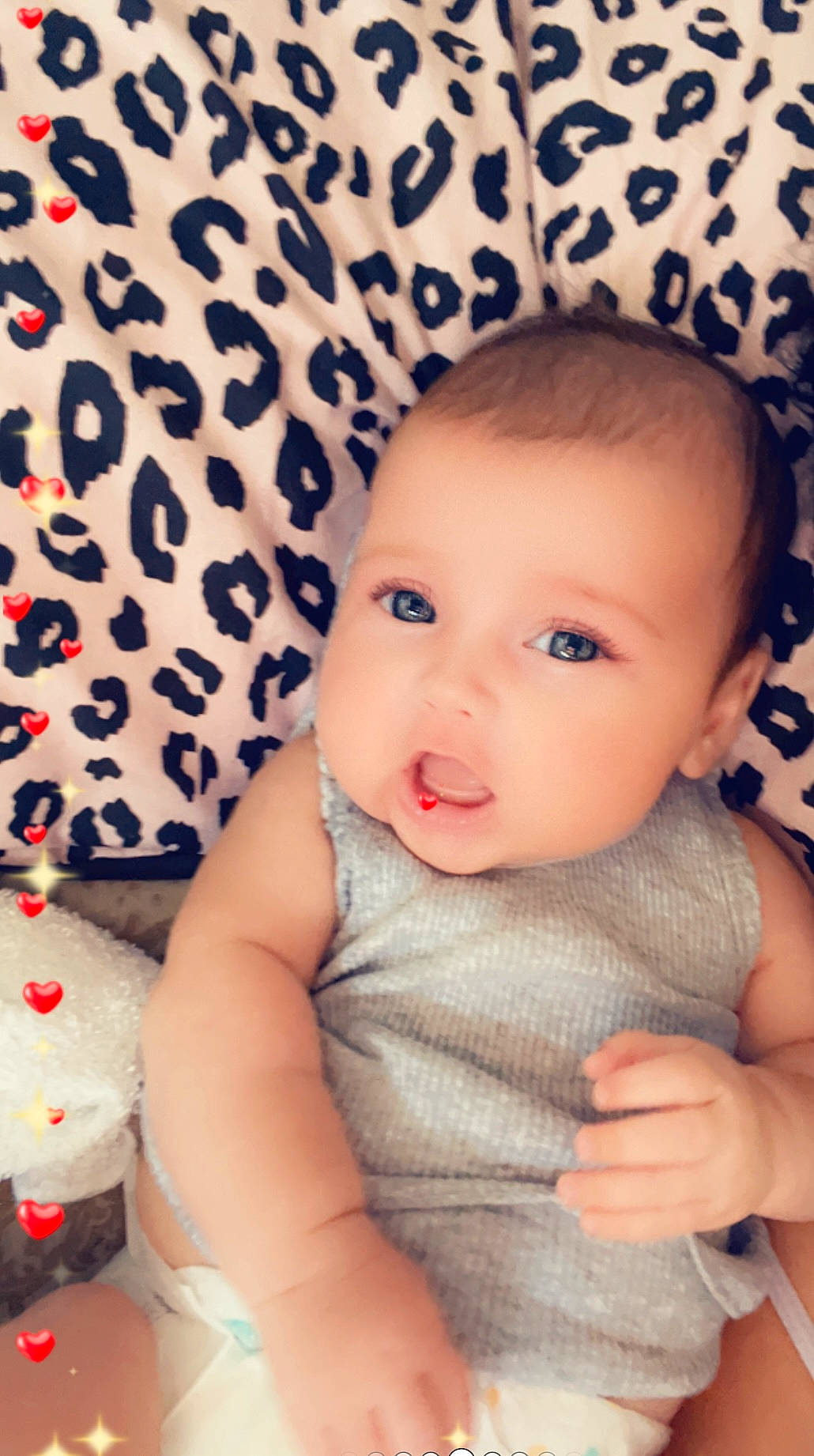 Summer is registered to the contest to win money with this photo: baby, baby_toddler_clothing, cheek, chin, cool, eye, eyebrow, facial_expression, hairstyle, happy, head, headgear, iris, lip, mouth, nose, person, skin, sleeve, textile