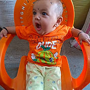 Pushti joined the competition — help win amazing prizes! baby, bodypart, chair, clothing, cushion, face, furniture, happy, head, homedecor, mouth, person, photography, plant, portrait, pottedplant, sitting, t_shirt, teeth, yawning