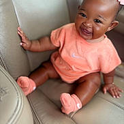 Deyana is registered to the contest to win money with this photo: apparel, baby, bow, car_interior, child, closeup, clothing, cute, face, fashion, hair, happy, infant, leather_seat, person, portrait, sitting, skin, smiling, socks