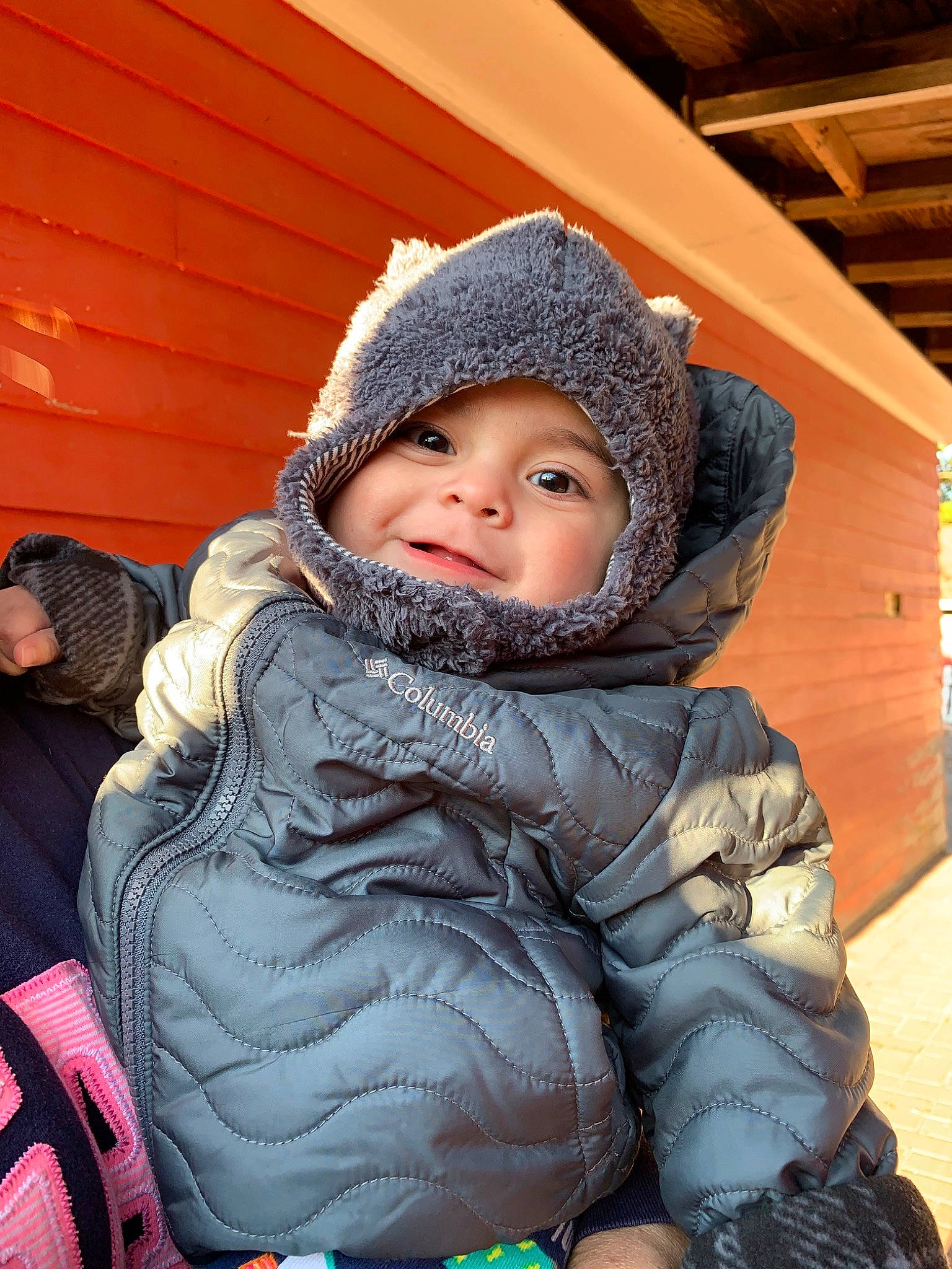 Jonathon is registered to the contest to win money with this photo: child, fun, headwear, person, skin, smile, snow, toddler, winter