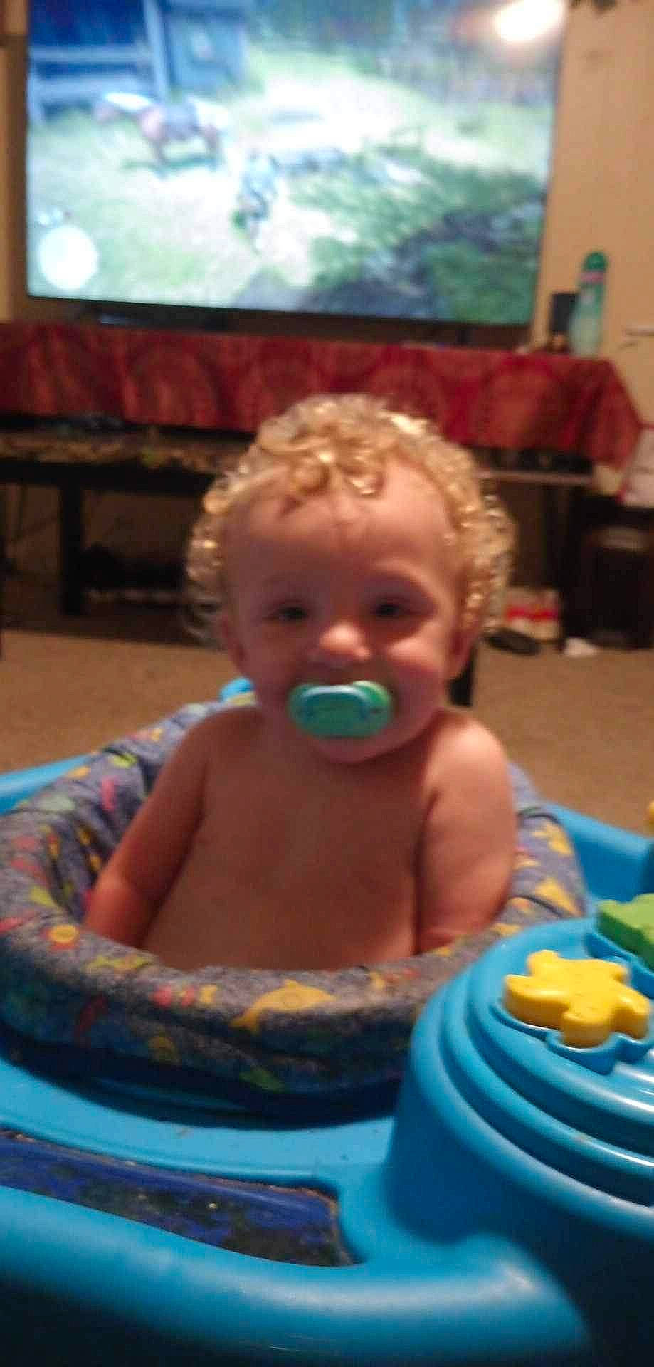 Tayshawn joined the competition — help win amazing prizes! baby, baby_products, bathing, blue, cheek, child, event, fun, happy, head, leisure, mouth, person, plastic, play, recreation, sitting, smile, television, toddler