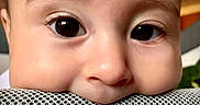 Alastar is registered to the contest to win money with this photo: babies, baby, cheeks, chubby_cheeks, close_up, curious, cute, expression, eyes, face, head, human, indoors, infant, looking, mesh_surface, playful, portrait, skin, young_child