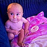 baby, blue, child, couch, cozy, cute, expression, face, foot, hand, indoors, infant, pillow, pink, plush, purple, seated, skin, soft, unicorn