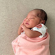 Ylona Margaret is registered to the contest to win money with this photo: newborn, baby, sleeping, blanket, pink, infant, soft, peaceful, wrapped, cute, resting, skin, face, hand, cozy, portrait, indoors, clothing, head, comfort