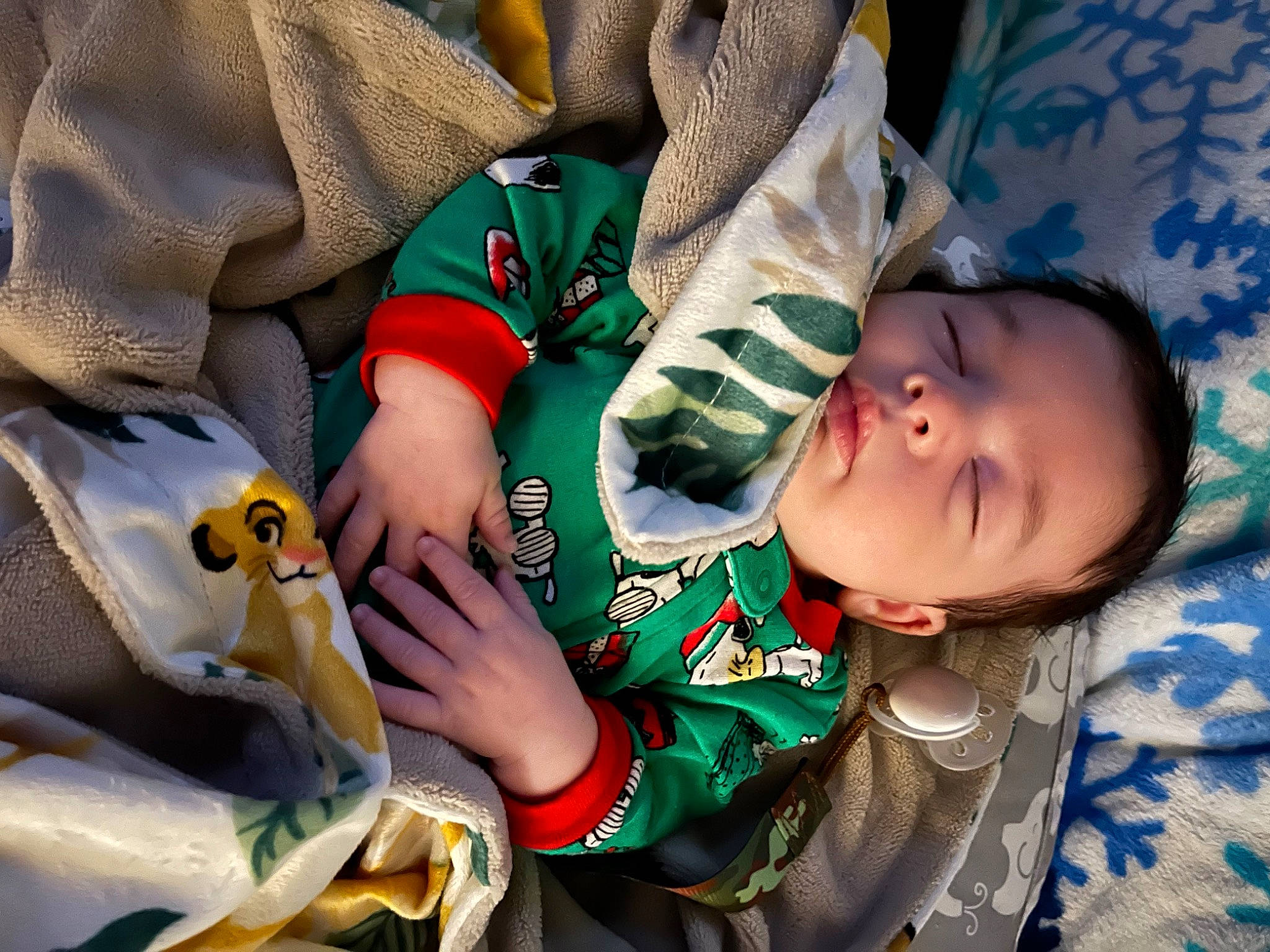 Leland is registered to the contest to win money with this photo: baby, baby_products, baby_sleeping, baby_toddler_clothing, bedtime, child, comfort, grass, happy, linens, nail, nap, pattern, person, play, product, sitting, skin, sleep, toddler