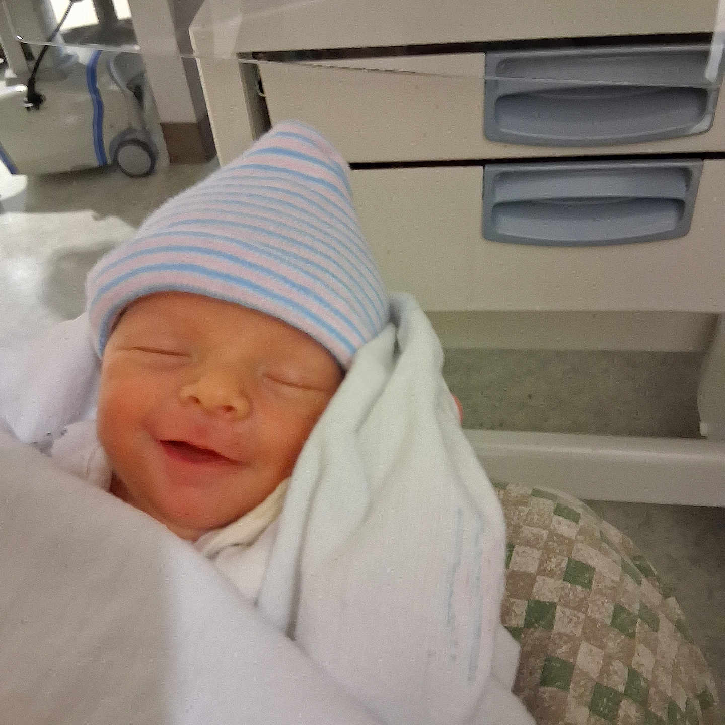 Chaos joined the competition — help win amazing prizes! baby, blanket, care, child, cozy, cute, face, hat, healthcare, hospital, indoor, infant, newborn, peaceful, person, resting, sleeping, smile, soft, wrapped