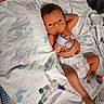 Chaos joined the competition — help win amazing prizes! baby, bed, blanket, child, cute, diaper, face, healthcare, hospital, infant, iv_line, lying_down, medical_equipment, monitoring_wires, newborn, patient, person, resting, skin, small